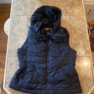 Like new! Puffy black vest